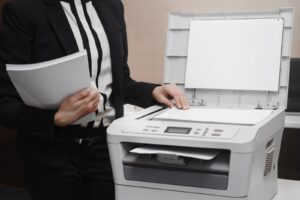person's hands using a scanner